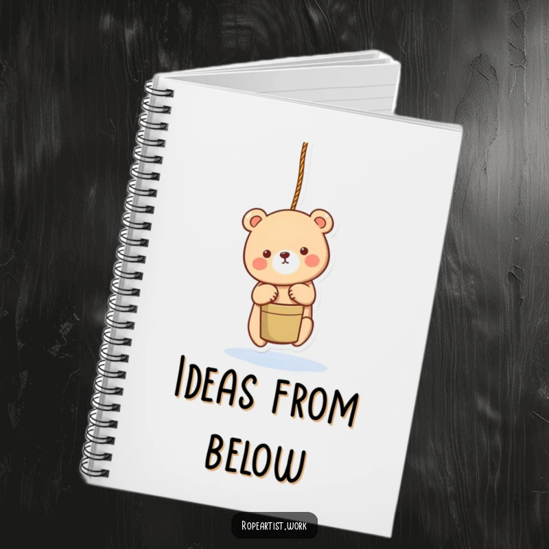 Funny bear notebook with an adorable character lowering a bucket with a rope, perfect for notes and journaling.