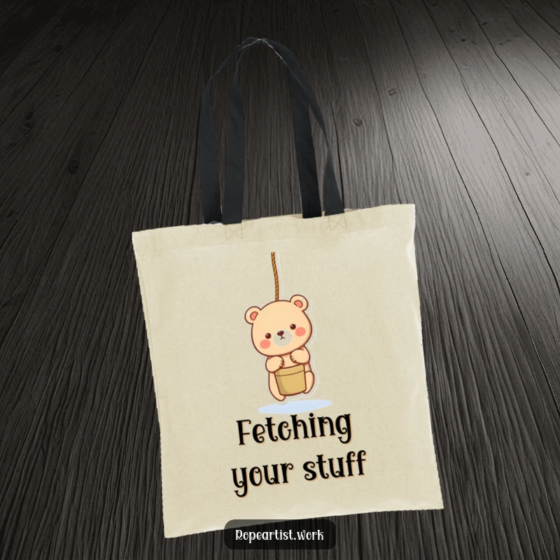 Funny bear tote bag with an adorable character lowering a bucket with a rope, perfect for shopping and daily use.